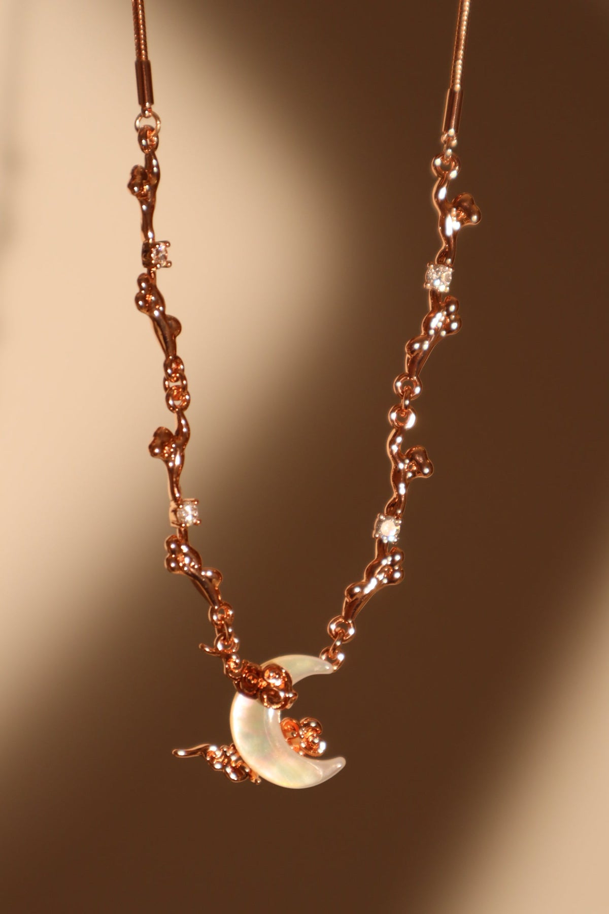 “Rose Gold Tone Plated Diamonds & Natural Shell Moon Necklace”