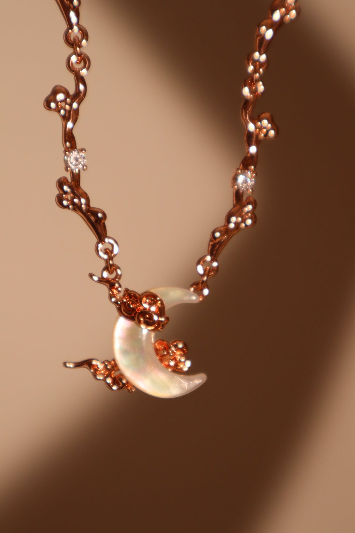 “Rose Gold Tone Plated Diamonds & Natural Shell Moon Necklace”
