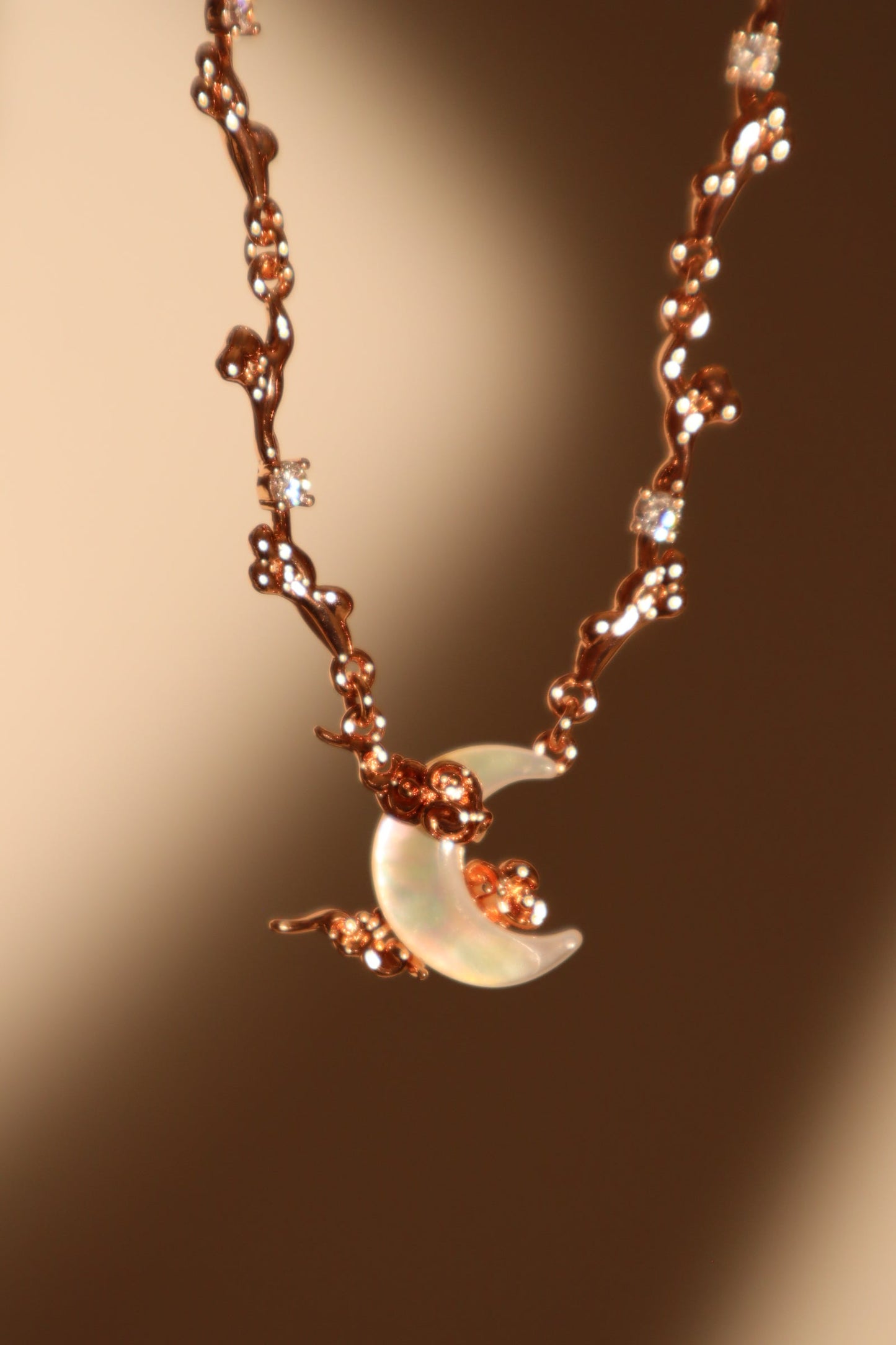 “Rose Gold Tone Plated Diamonds & Natural Shell Moon Necklace”